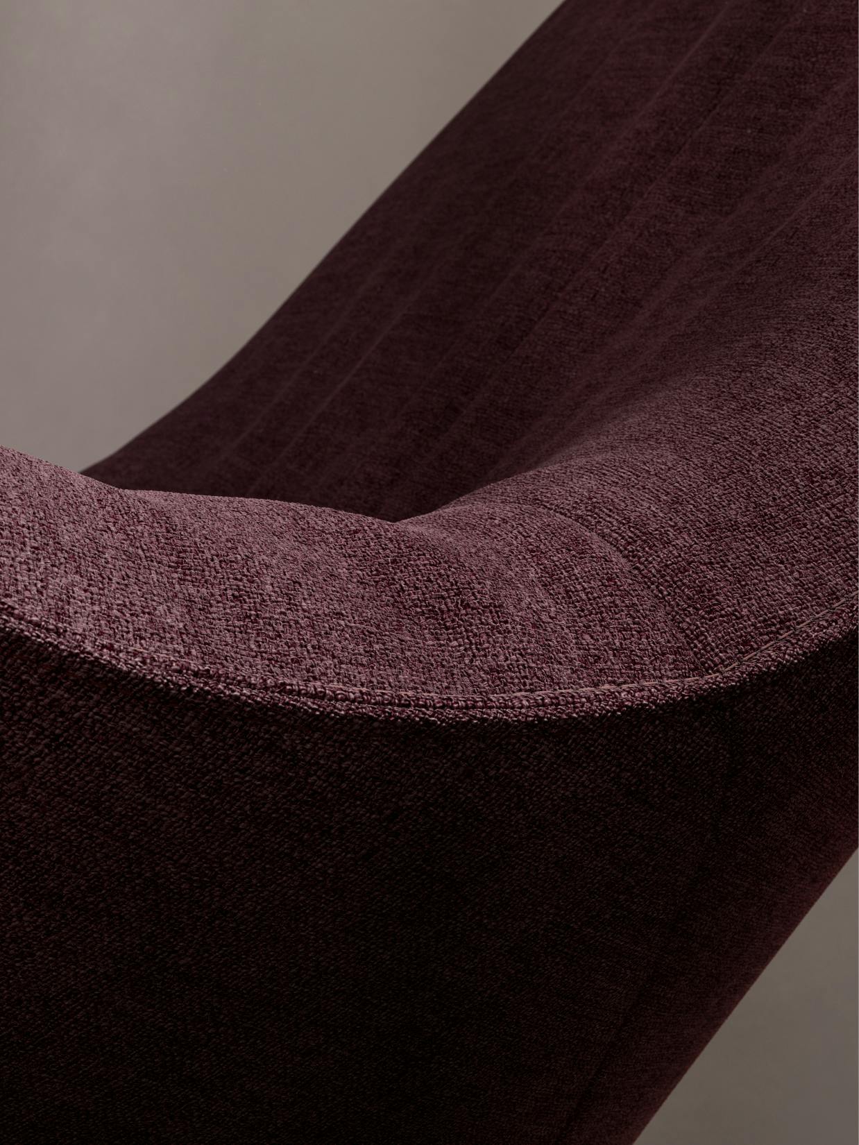 Walter Knoll – Brand Design, E-Commerce, Experience Design "The essence of excellence": Photo showing a close-up of dark red textured fabric with soft lighting x HY.AM Studios