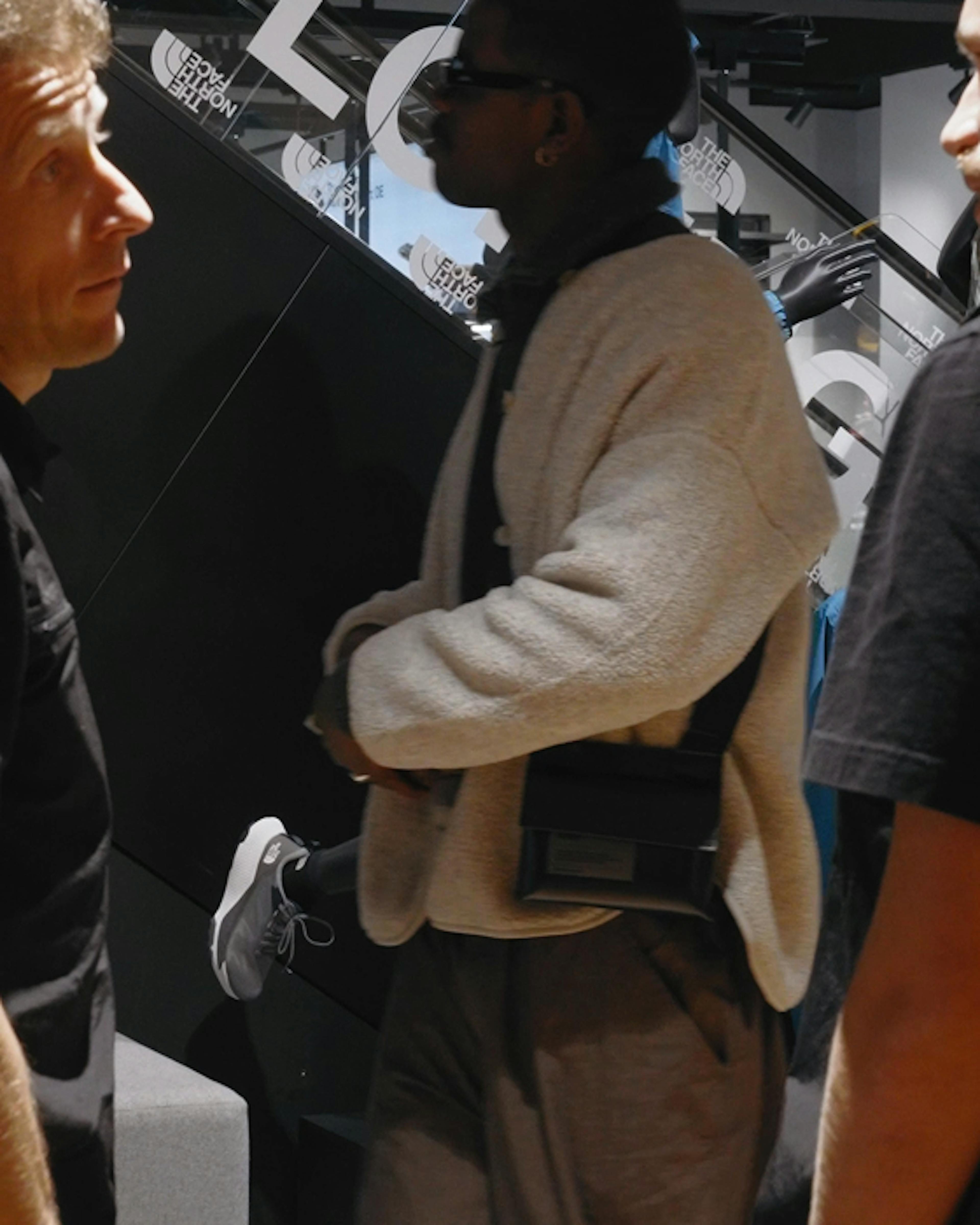 The North Face – Brand Activation "Summit Series Brand Activation": Photo showing three people in a store, with The North Face branding visible in the background x HY.AM Studios
