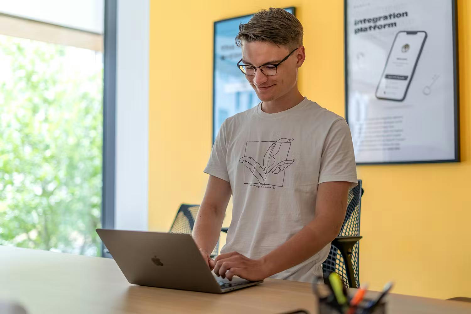 marketing strategist working on his laptop