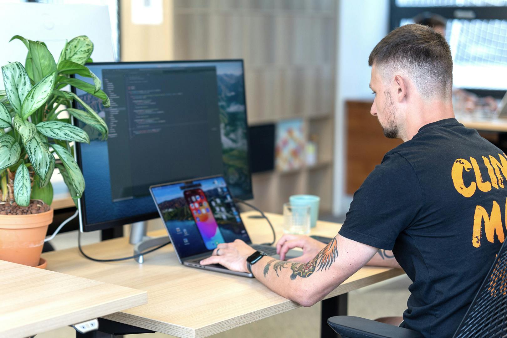 ios developer coding on a laptop