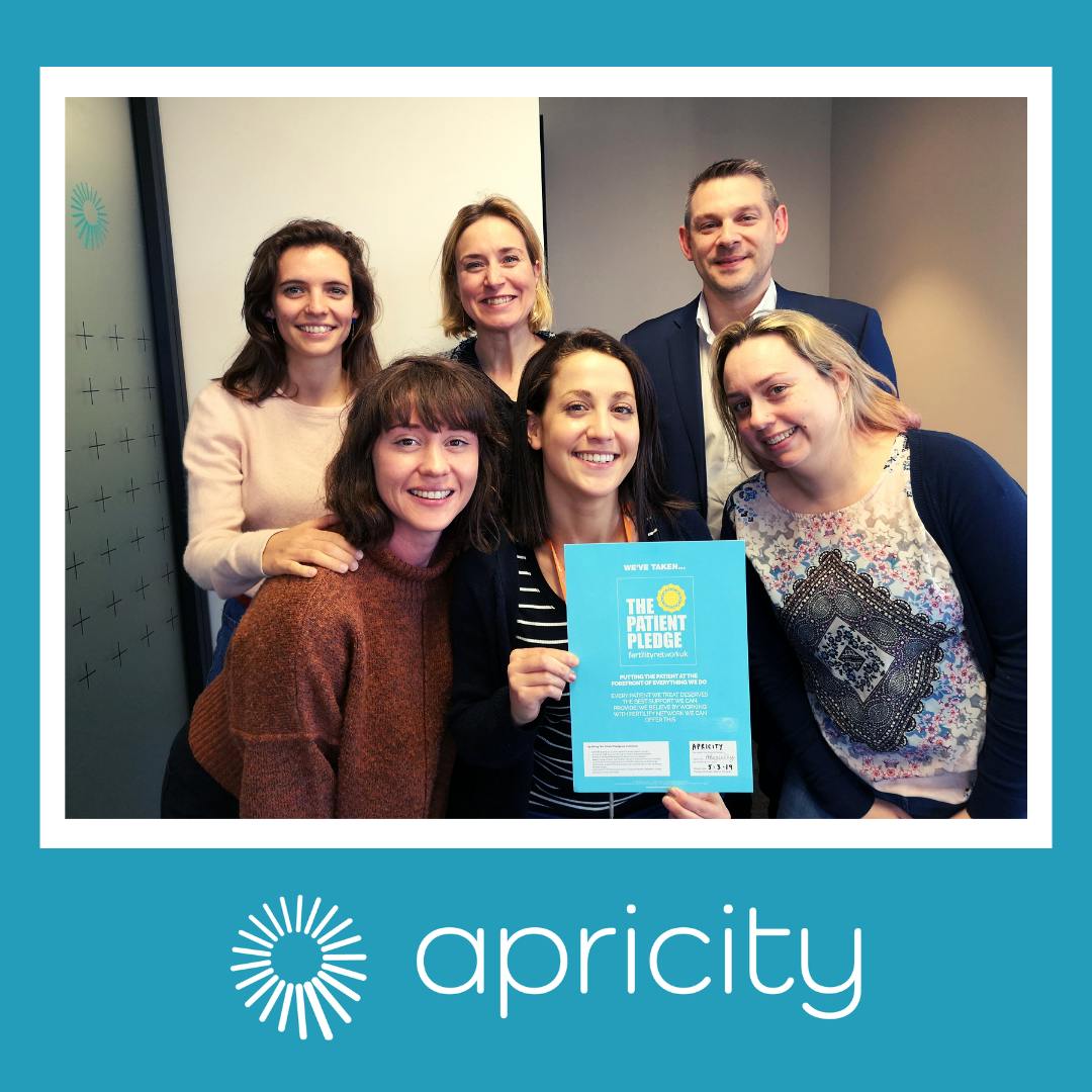 Apricity team holding Fertility Network Patient Pledge