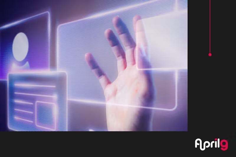 A hand reaching towards a futuristic digital interface with glowing purple and blue elements. The interface displays abstract shapes and lines, suggesting a high-tech, interactive display or hologram.