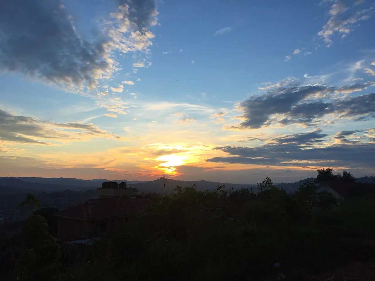 Calm evening in Kampala with a breathtaking sunset as seen from Buziga hill
