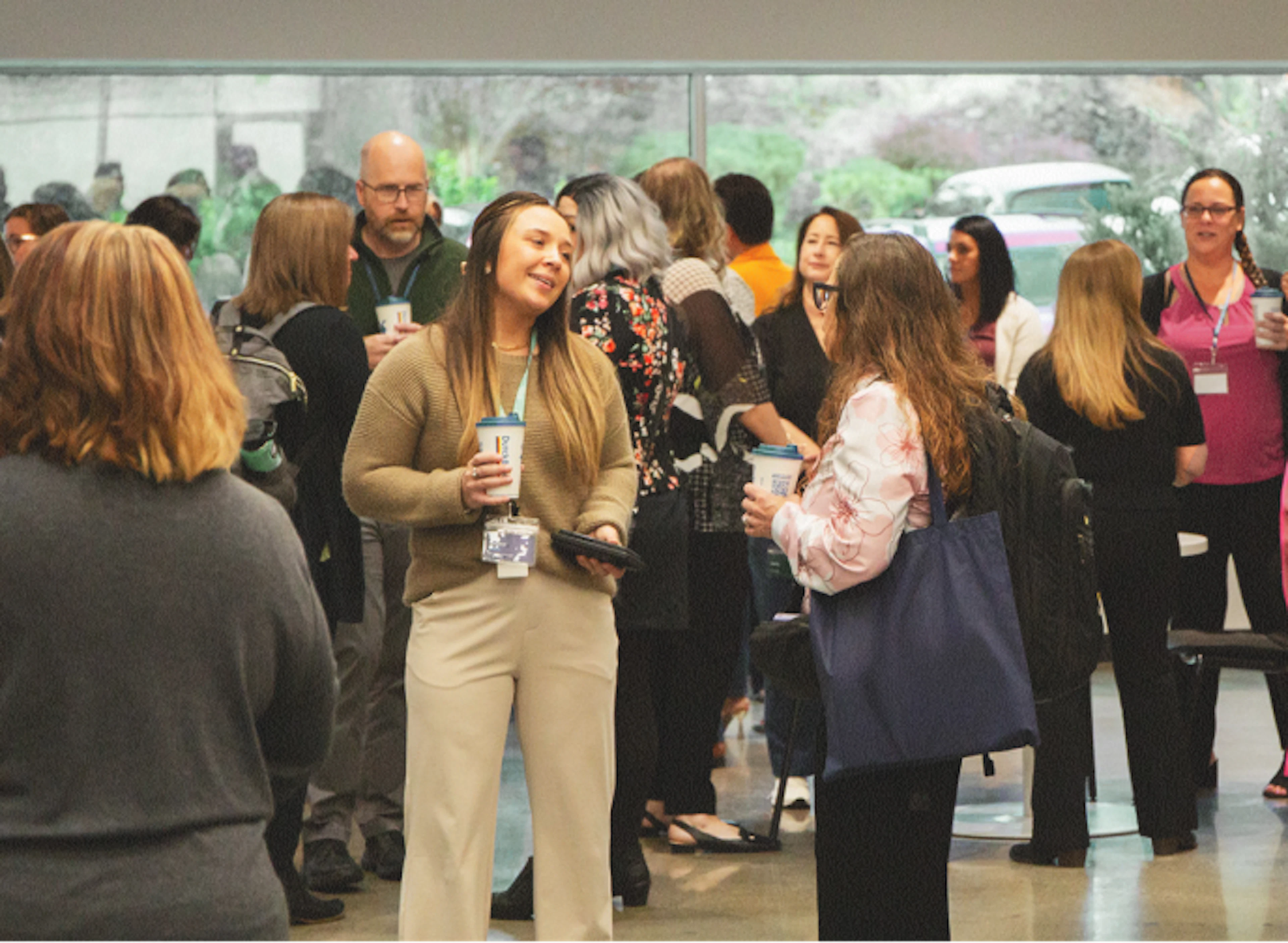 People gathering for a social event in a corporate event venue