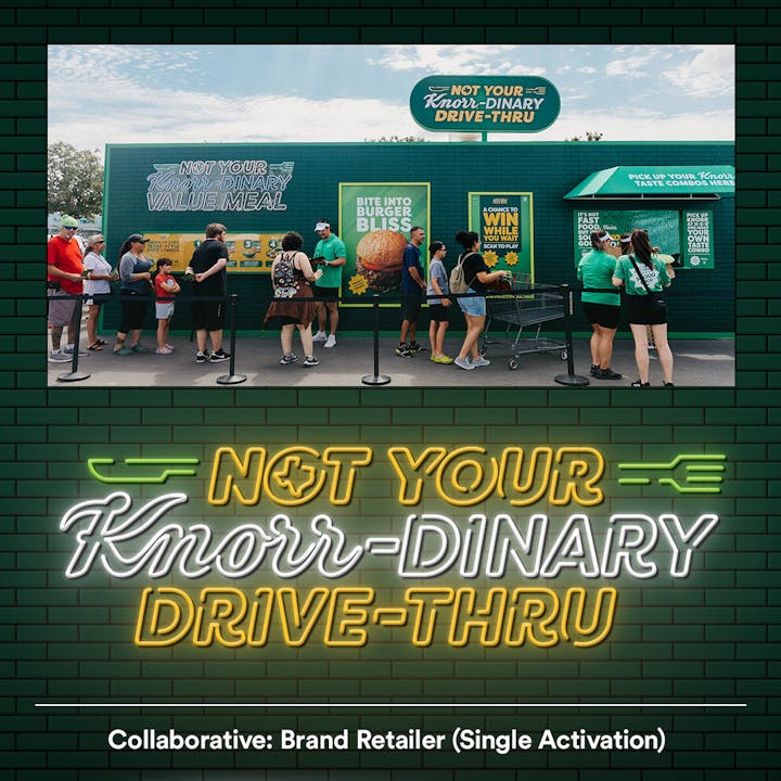 People standing at drive-up window at Not Your Knorr-dinary event