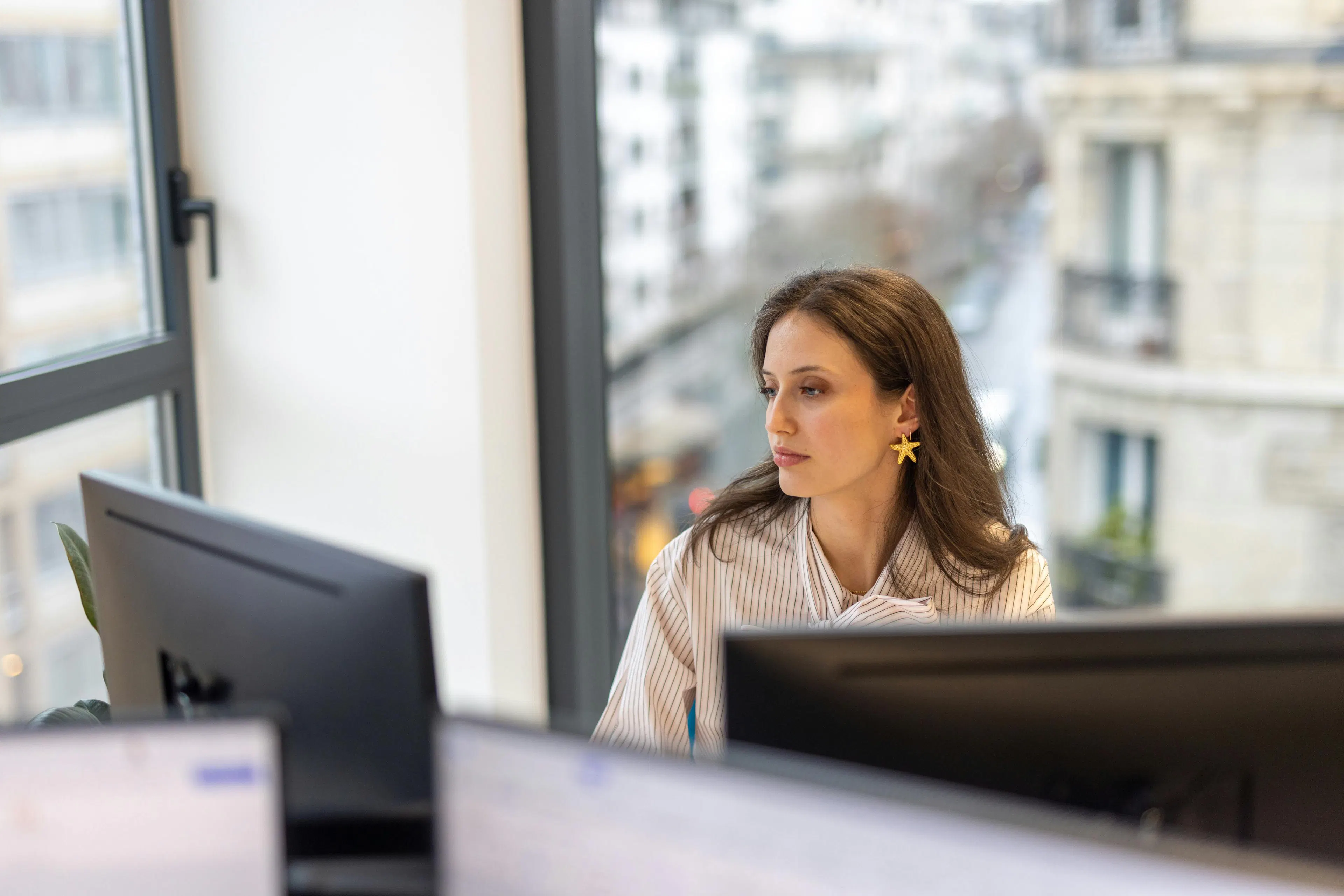 A colleague working on her computer