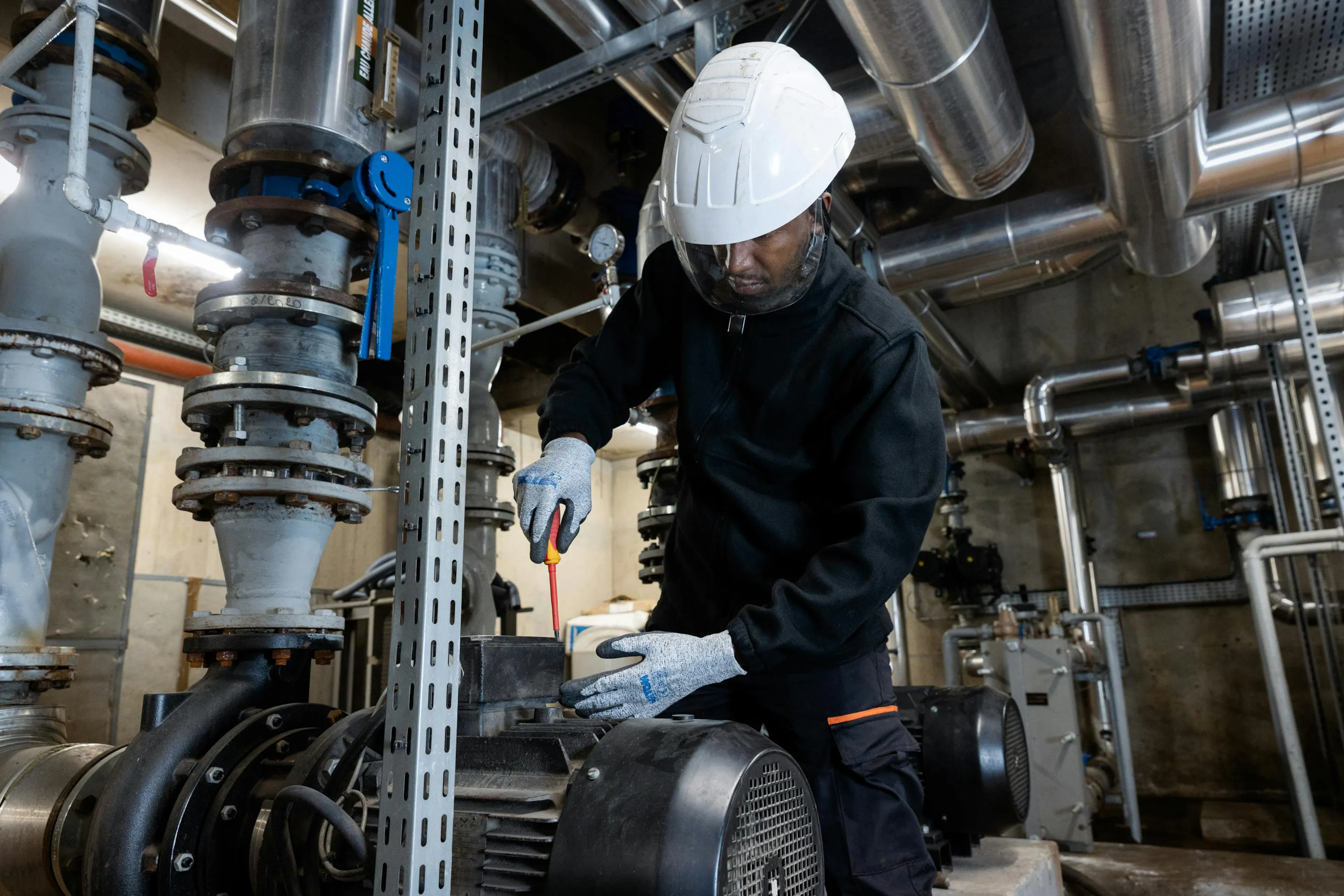 Technician working on technical building installations