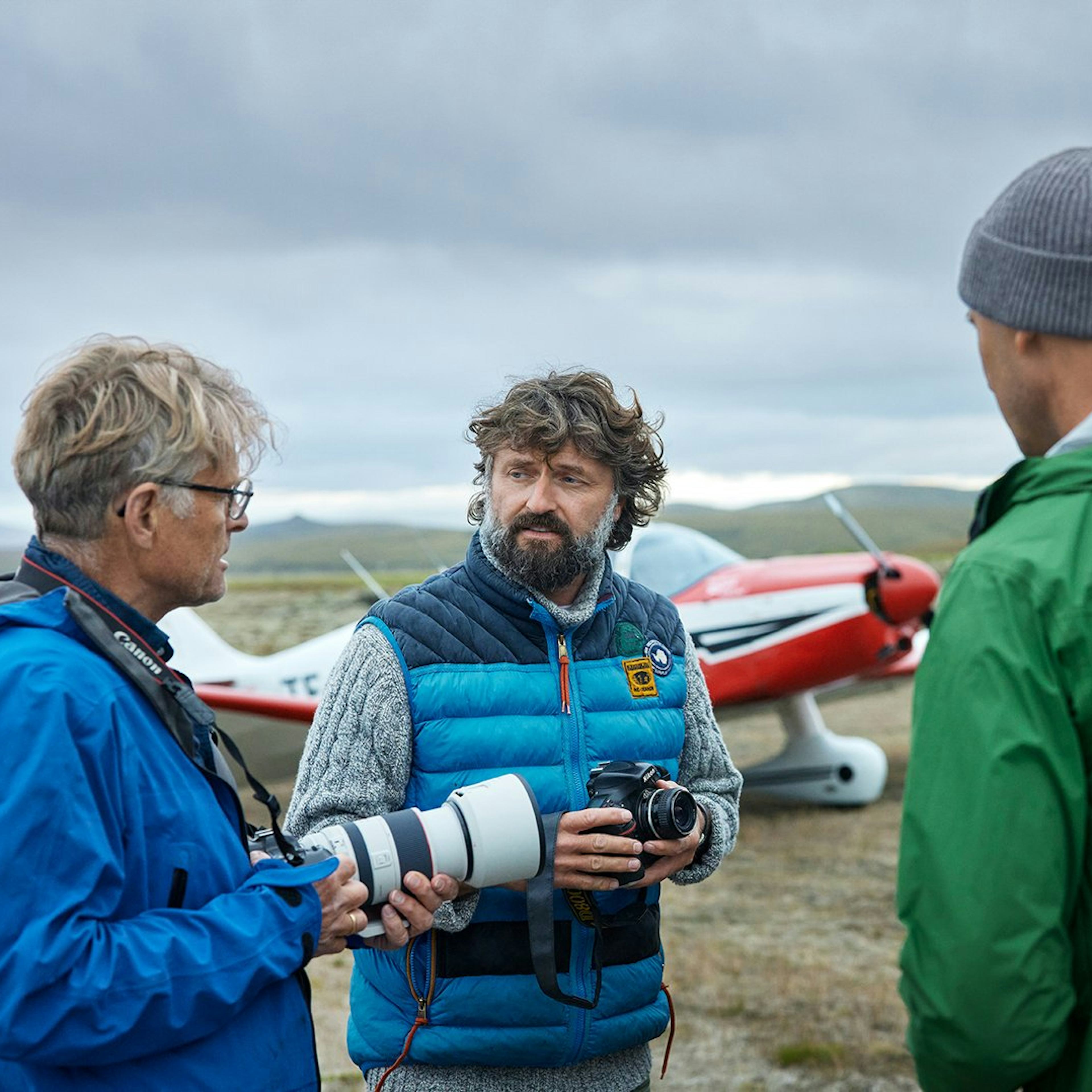 Fólk að taka ljósmyndir