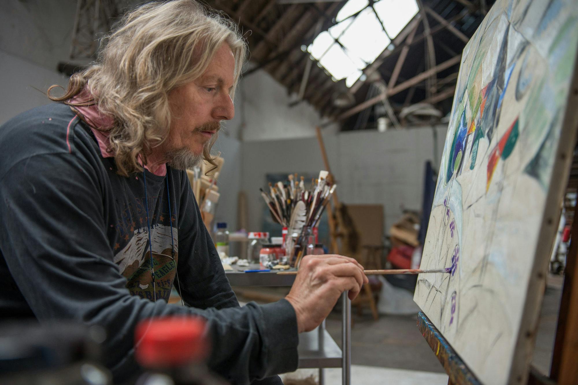 Wolfgang Beltracchi painting in his studio.