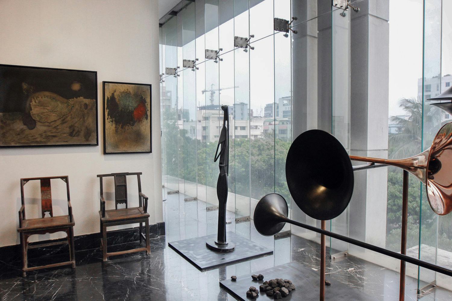 From left: Murtaja Baseer, The Wall (series) (1969); Mohammad Kibria, Untitled (1965); Ai Weiwei, Fairytale - 1001 Chairs (2007); Novera Ahmed, Standing Figure (1960); Alicja Kwade, Hypothetisches Gebilde (2017)