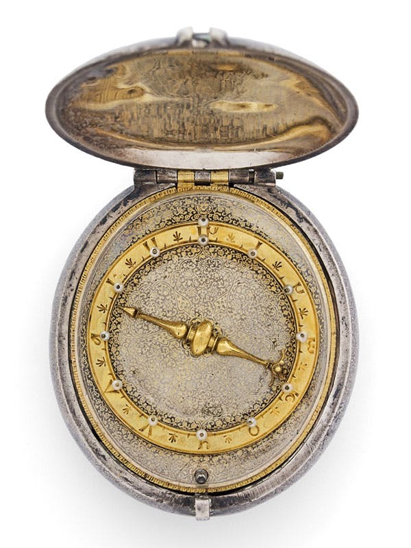 AMELI SAHIBI BULUGAT  Galata, Constantinople  Milieu XVIIe siècle  Montre ovale à une seule aiguille en argent niellée et damasquinée, sertie de perles, pré balancier spiral, fabriquée pour le marché de l’Empire Ottoman   Estimation : 40 000 - 60 000€ 