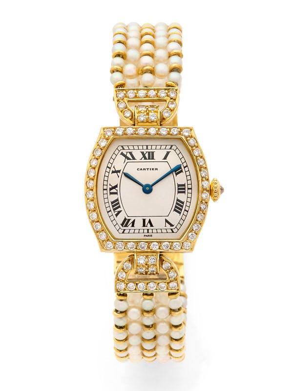 Cartier
« Tortue »
or jaune, diamants et perles
Estimation : 7 000 - 9 000 € 