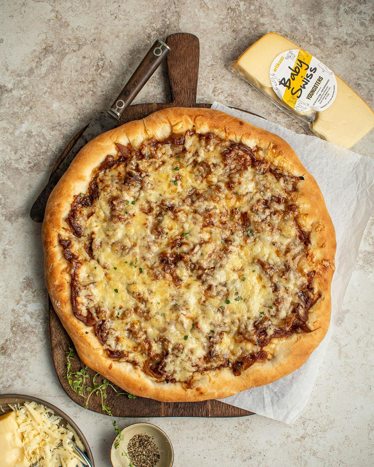 French onion and Swiss cheese pizza