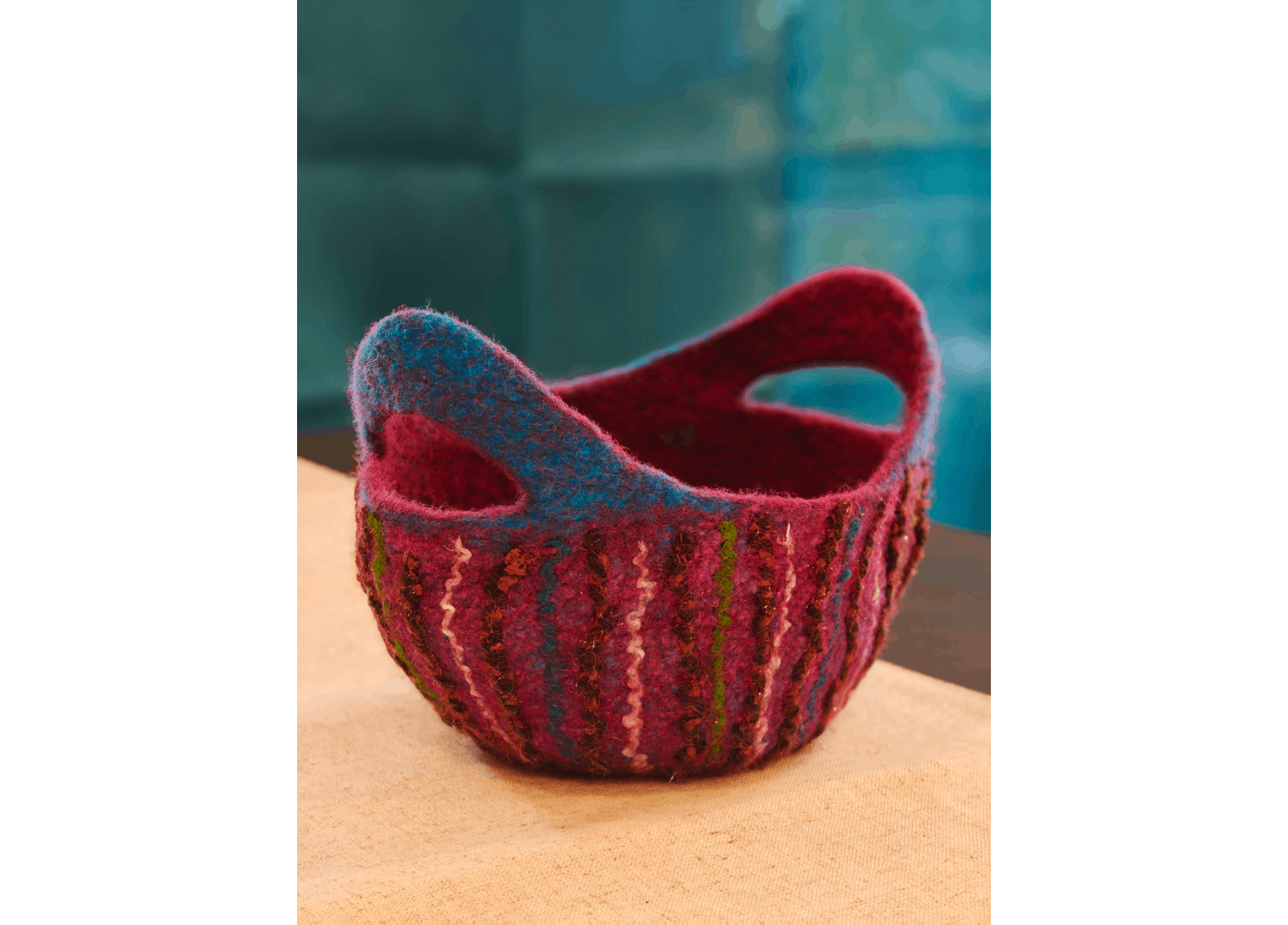 Felted basket on a table