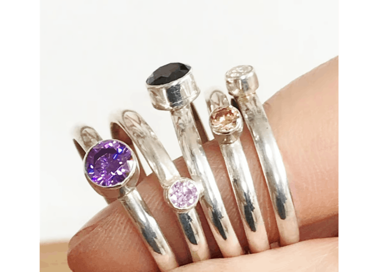 Silver rings with faceted gemstone