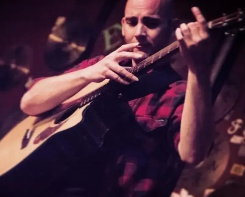 Kyle Pullan playing guitar