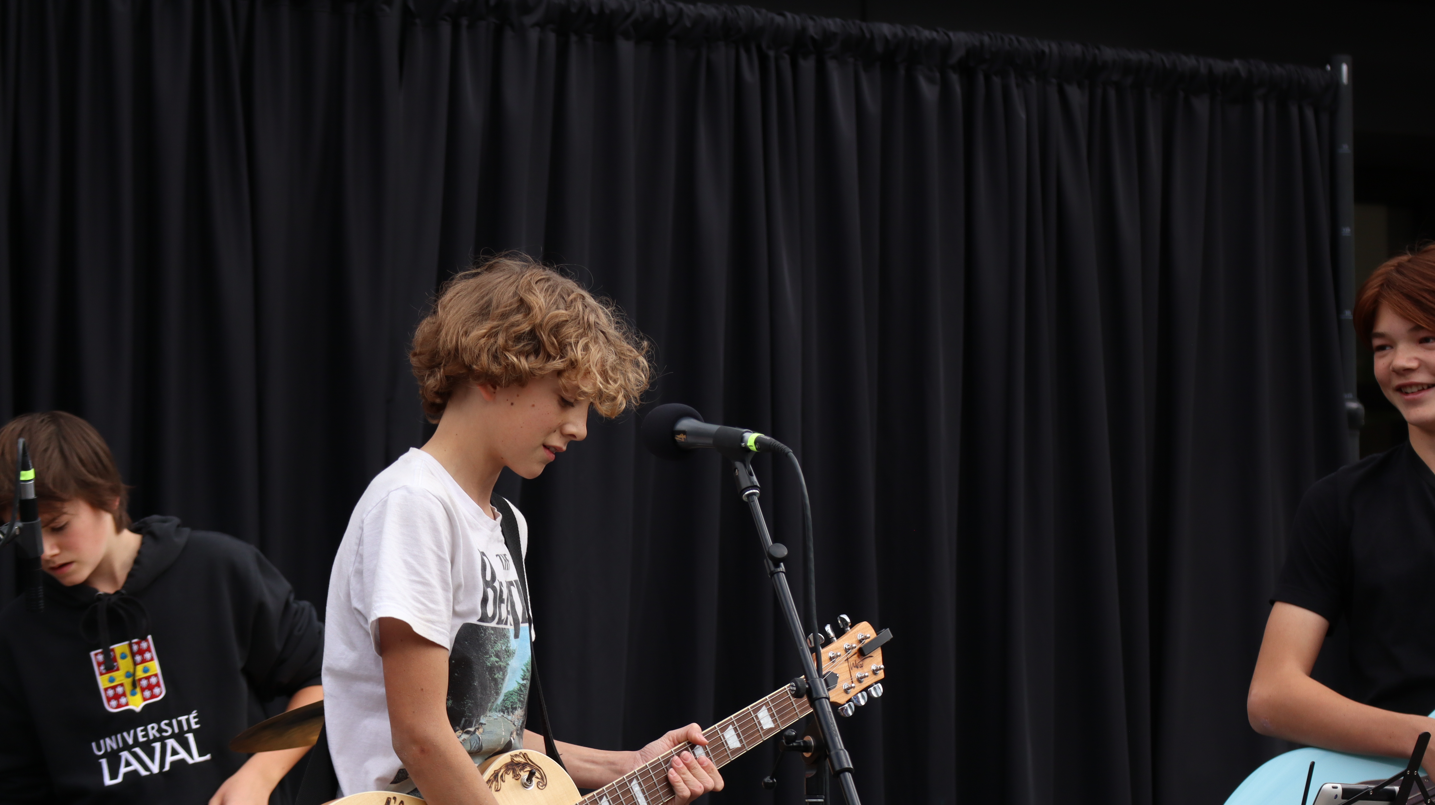 young musician playing guitar
