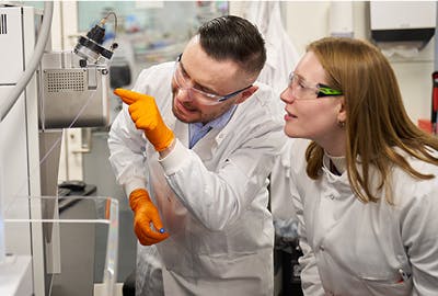 Researchers in a lab.