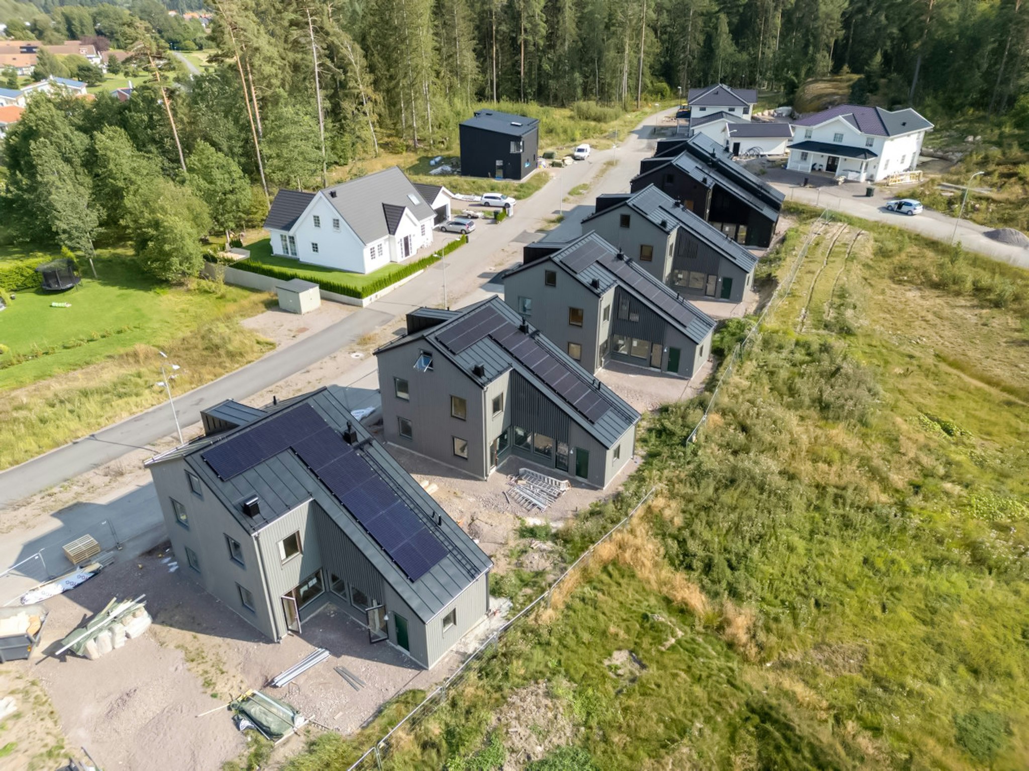 Arkitekt bostäder - bostadsområde med friliggande villor och parhus ritat av Ascape Arkitektur