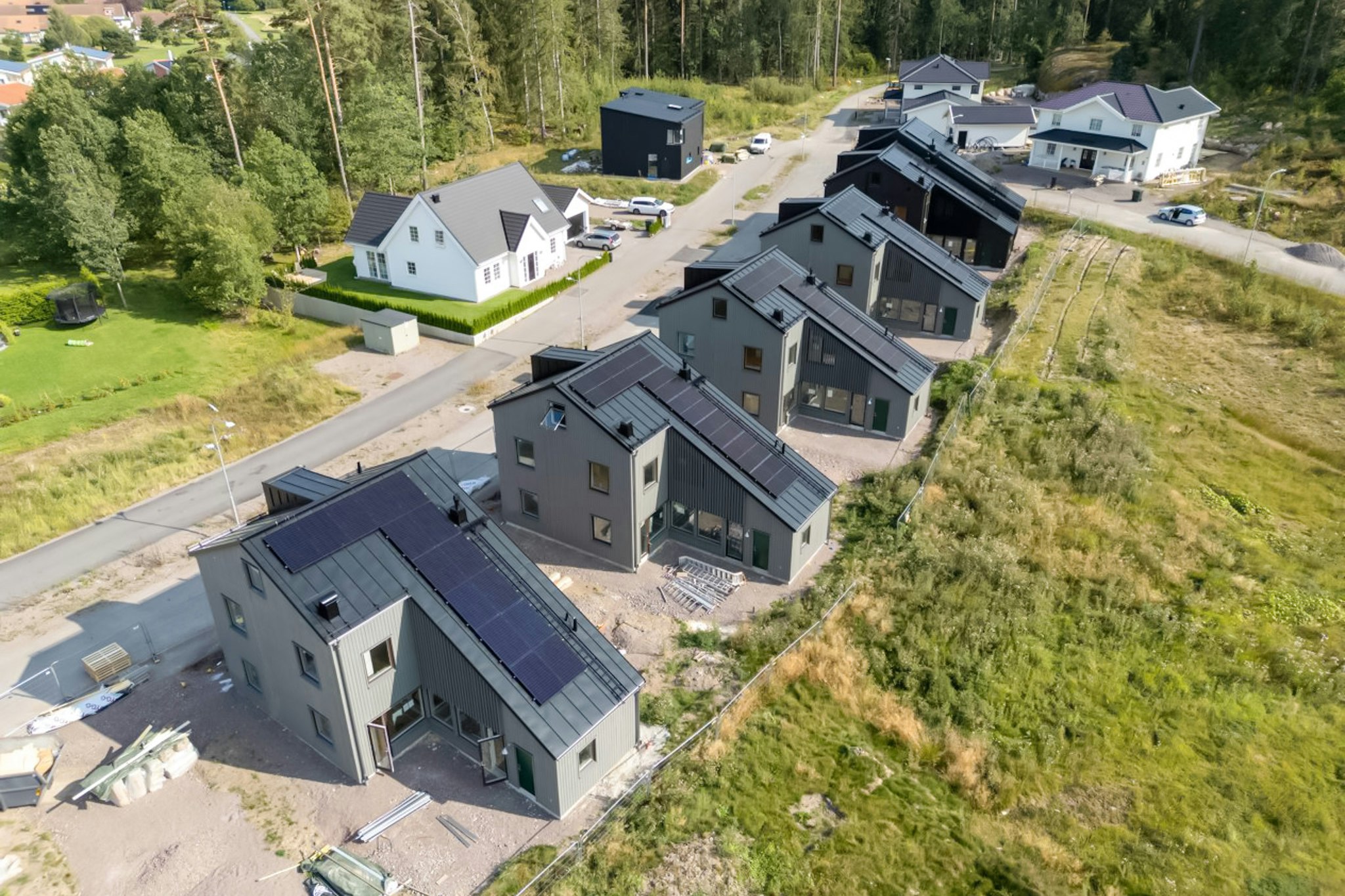 Arkitekt bostäder - bostadsområde med friliggande villor och parhus ritat av Ascape Arkitektur