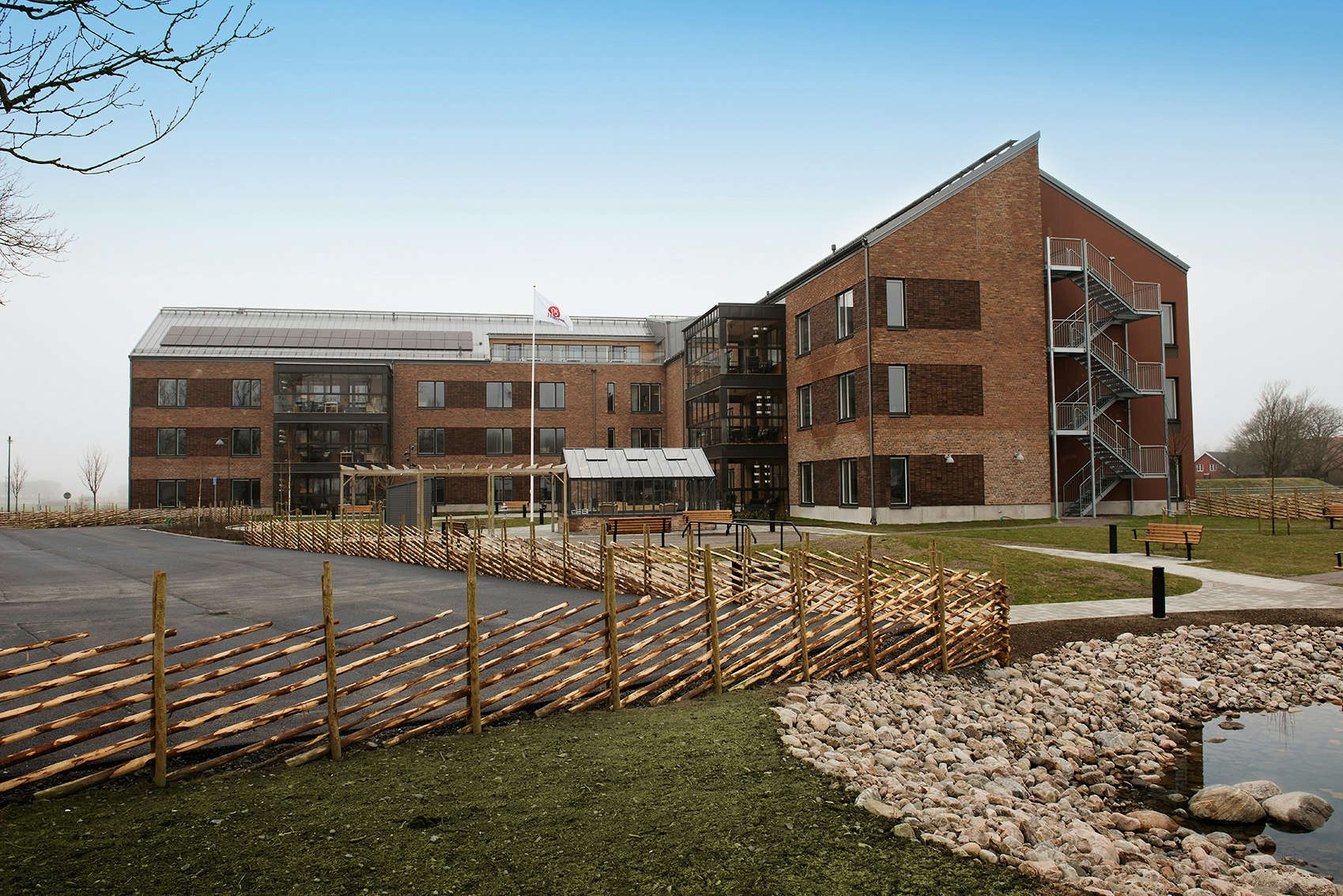 Arkitekt äldreboende - omsorgsboende i tegel ritat av arkitektbyrå Ascape