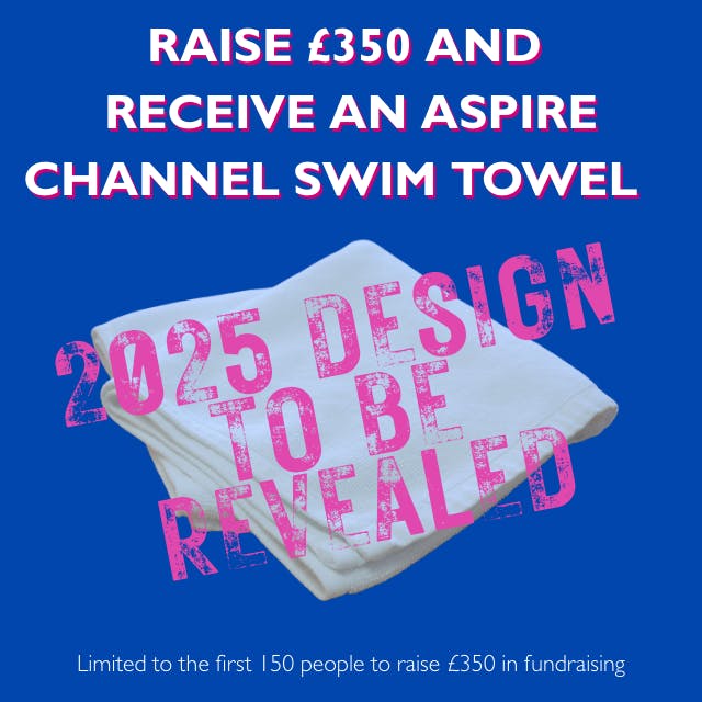 Image of white towel with words 2025 Design To Be Revealed