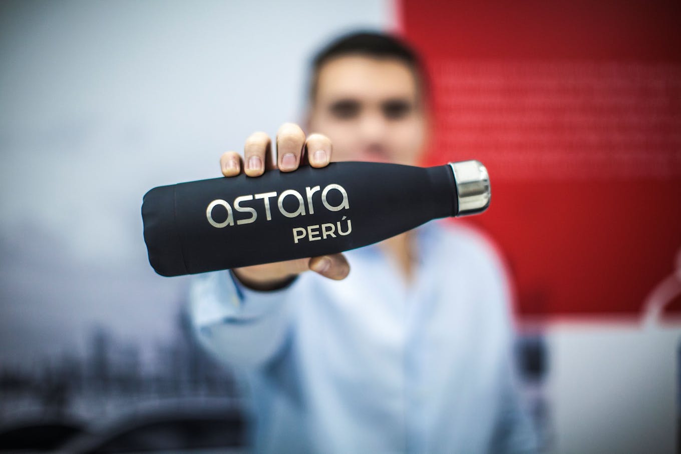 Astare Perú logo on bottle
