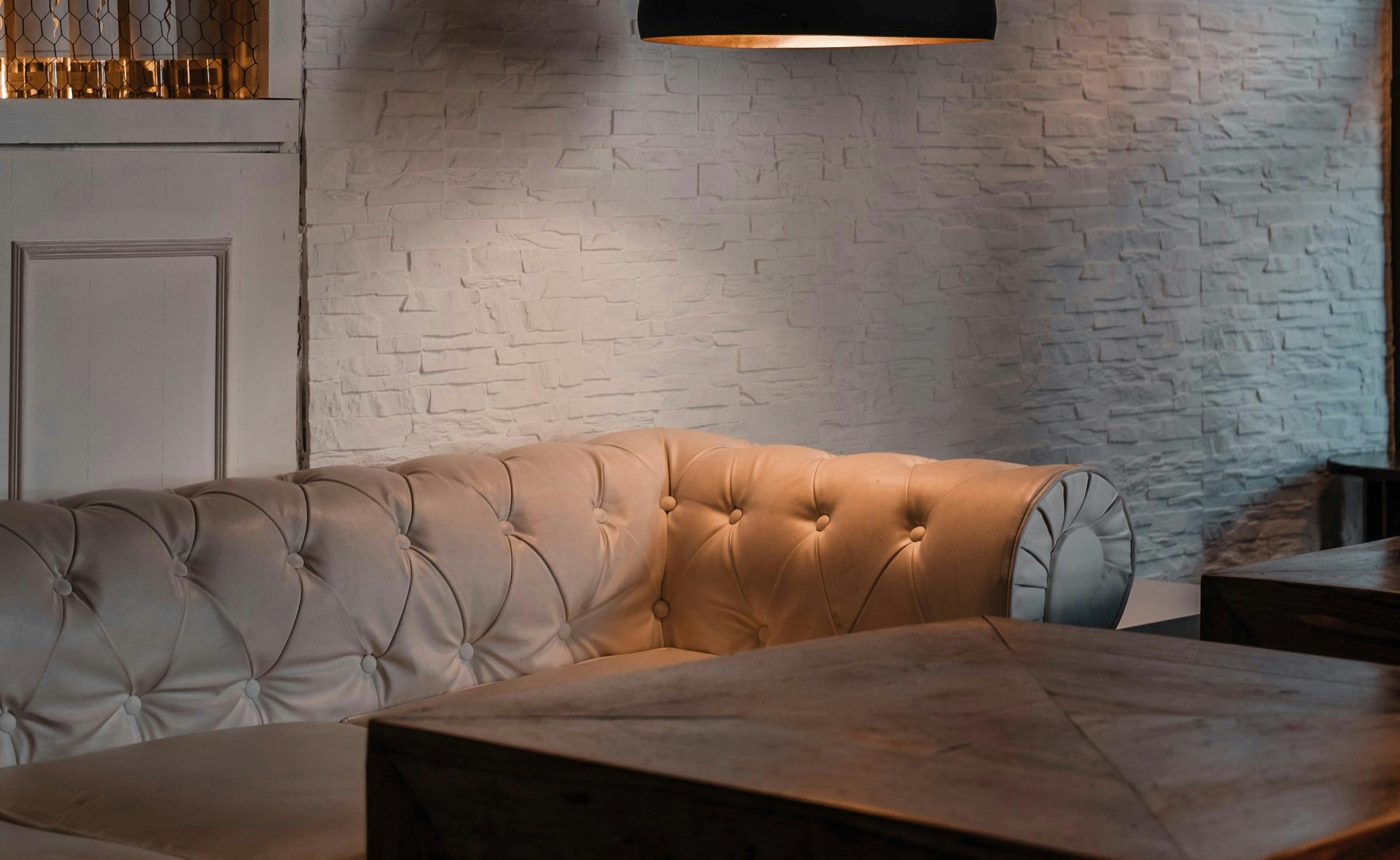 A white sofa and table