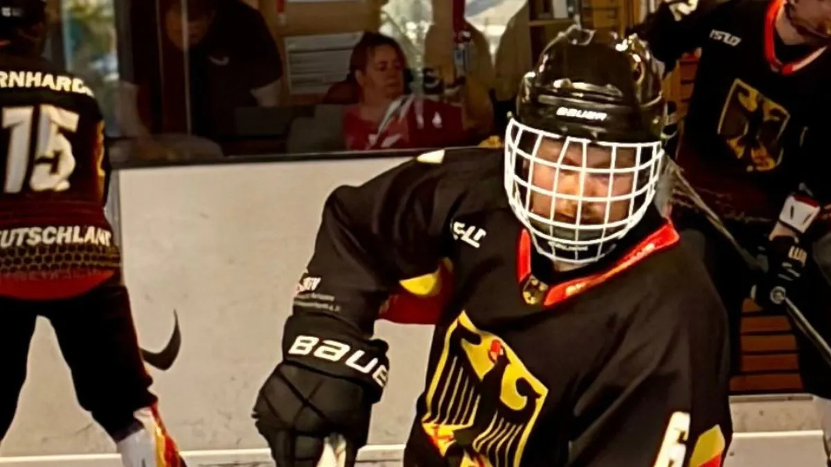 Players from the German national inline skate hockey team with the ball at the 2026 IISHF European Championship