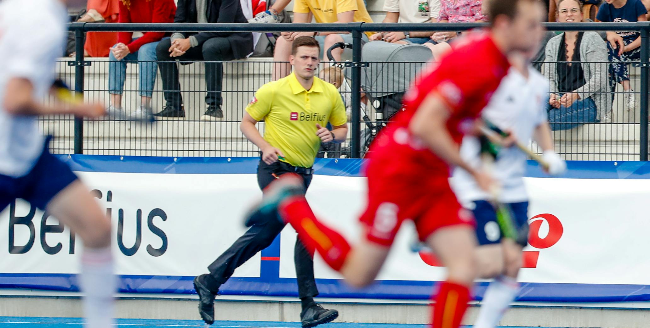 Referee observing a hockey match