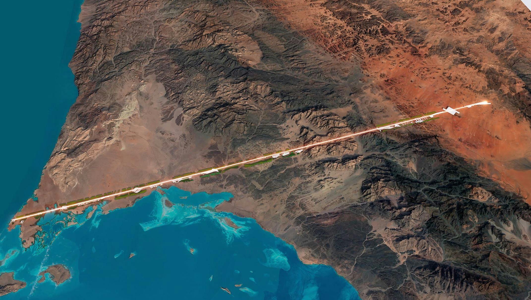 A large land mass next to the ocean with a straight man-made structure in the middle.