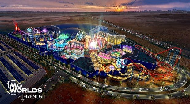 Theme park with colorful lights in the middle of a desert.