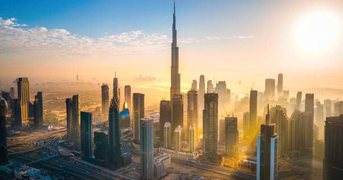 Drone view of the sunrise over the city of Dubai