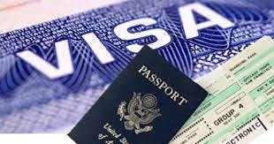 Travel documents, including a visa and passport.