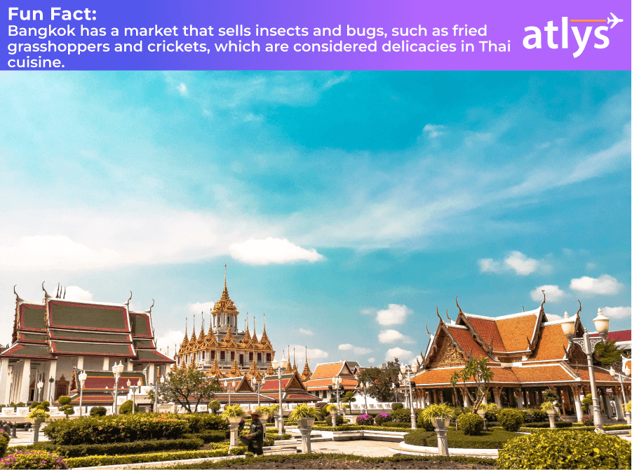 Traditional buildings in Thailand with gardens between the buldings on a nice sunny day.
