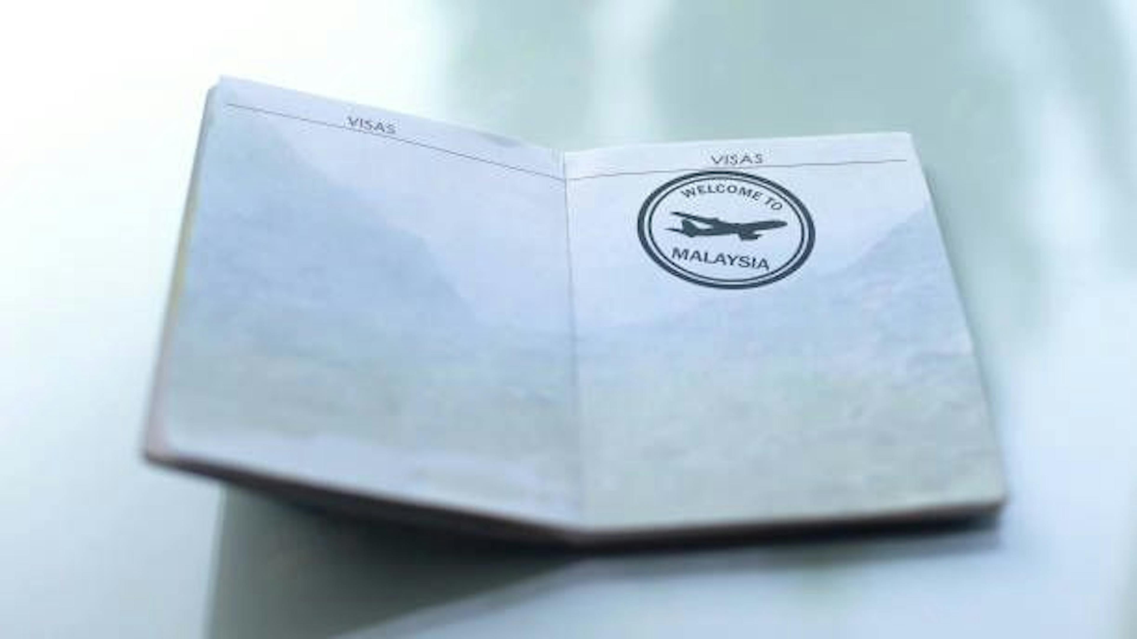 Welcome to Malaysia seal, stamped in passport, custom office, travelling abroad.