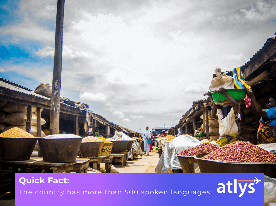 A village in Nigeria, people can be seen showcasing their spices and food.