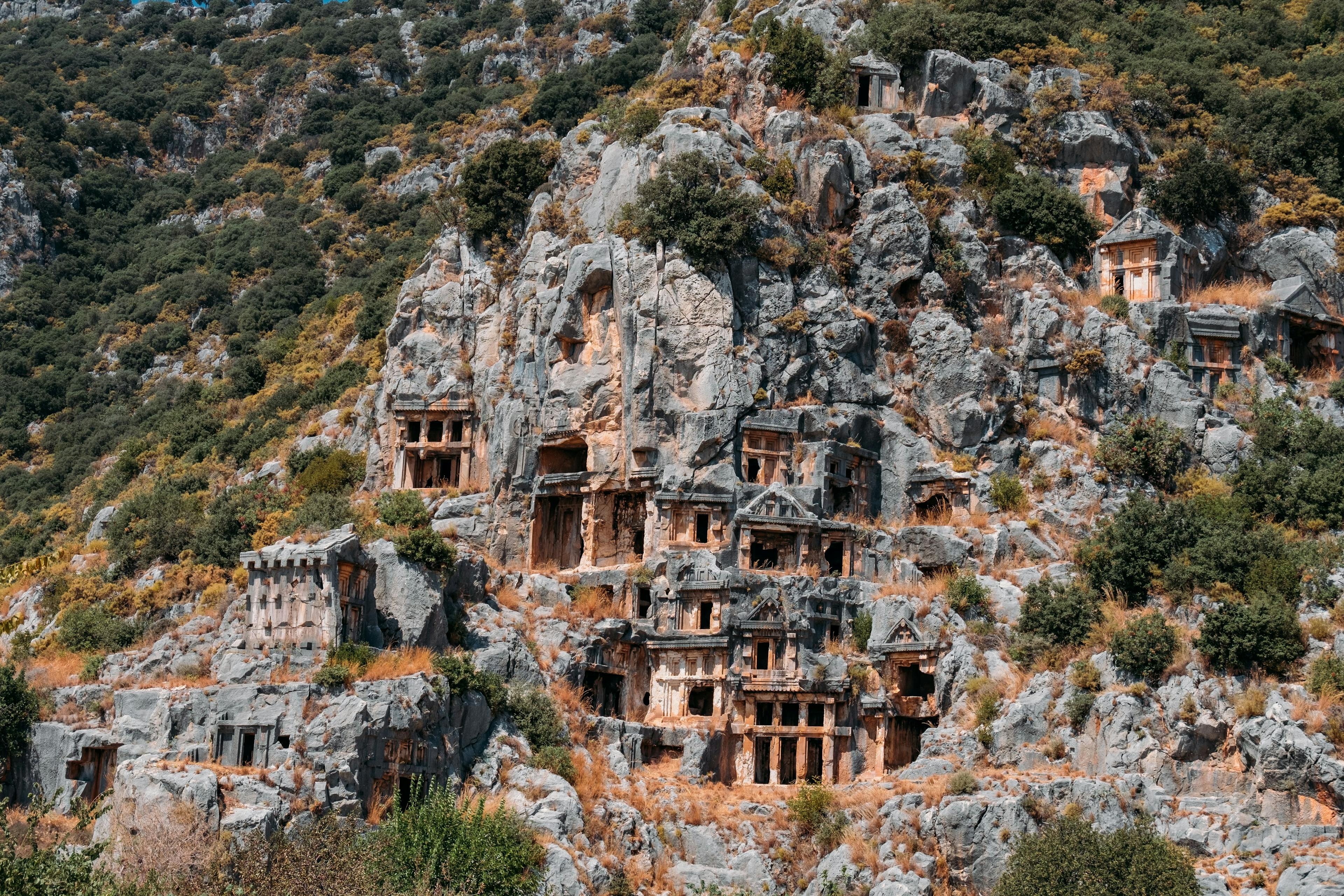 The beautiful eerie tombs carved into the cliff at Myra Necropolis