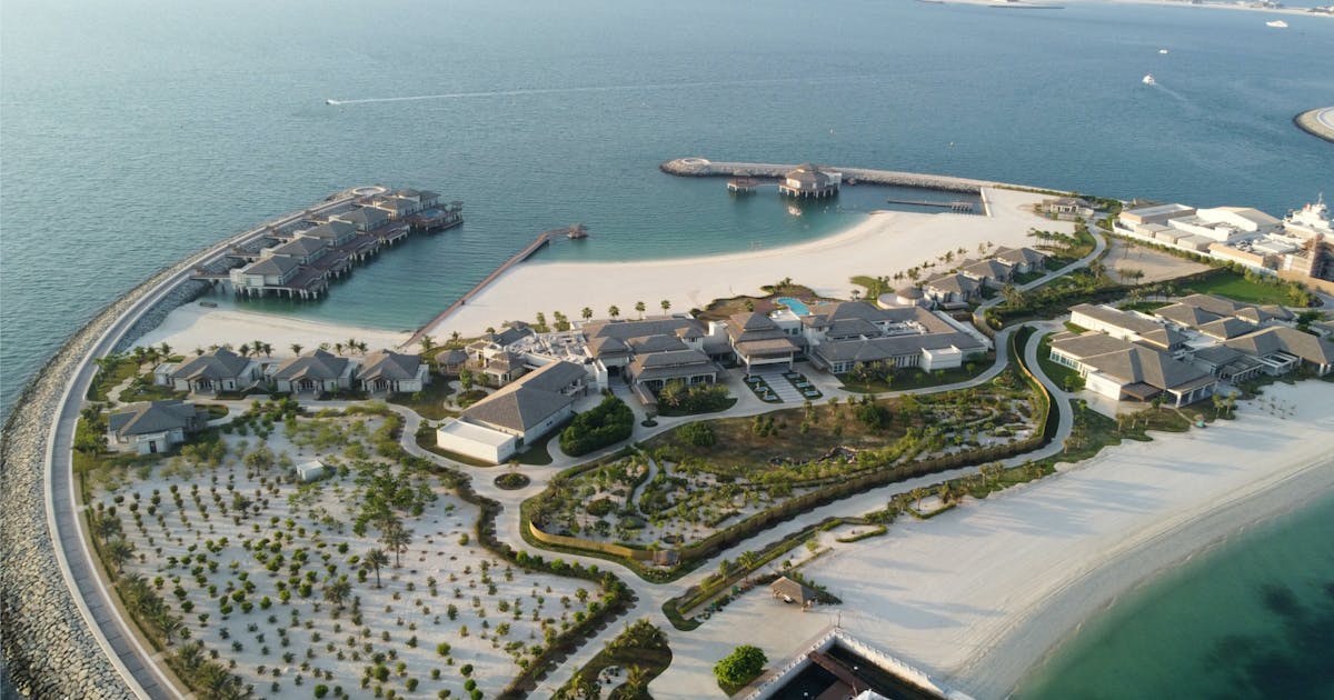 an aerial view of a resort and marina