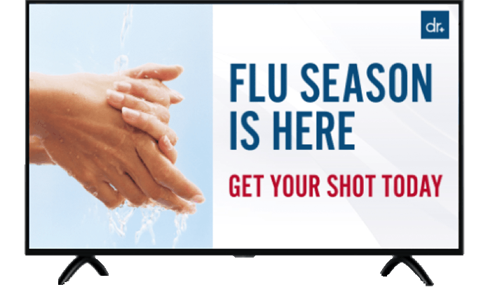 A medical office promoting flu shots on Atmosphere TVs using Atmosphere's digital signage tool.
