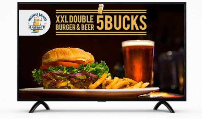 A digital signage promotion for a discount on burgers at a bar.