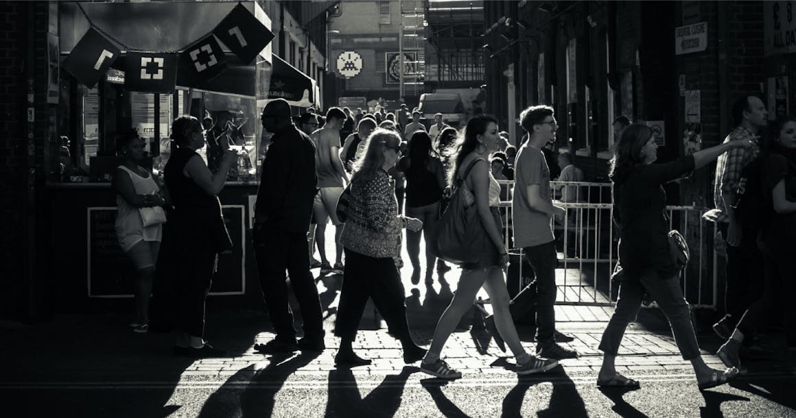People walking in a busy city street