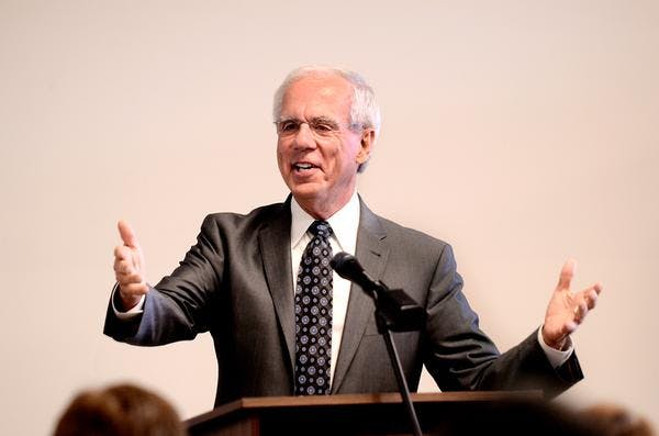 Tony Coelho speaking at a podium