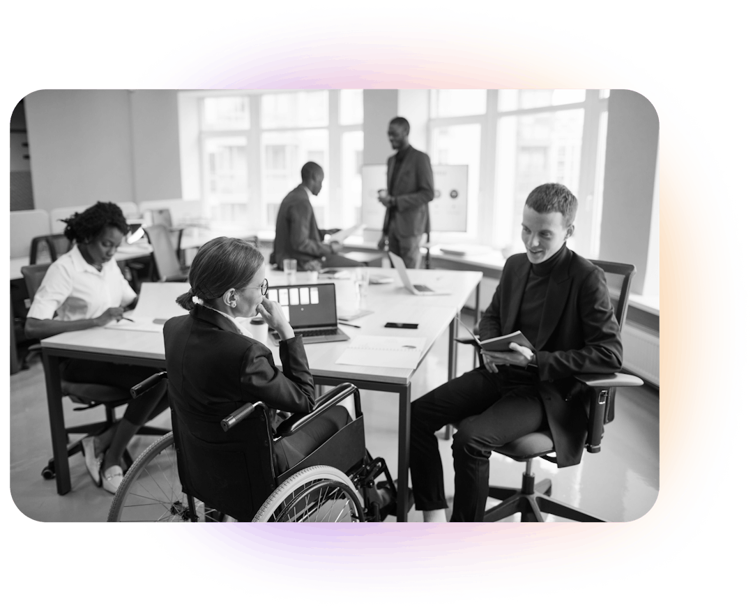 Diverse set of colleagues working in an offer together