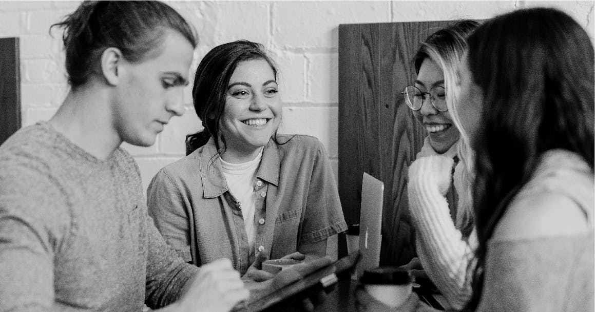 Image of people four working together