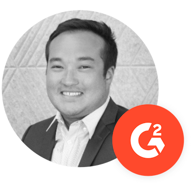 Headshot of Tim with the G2 logo