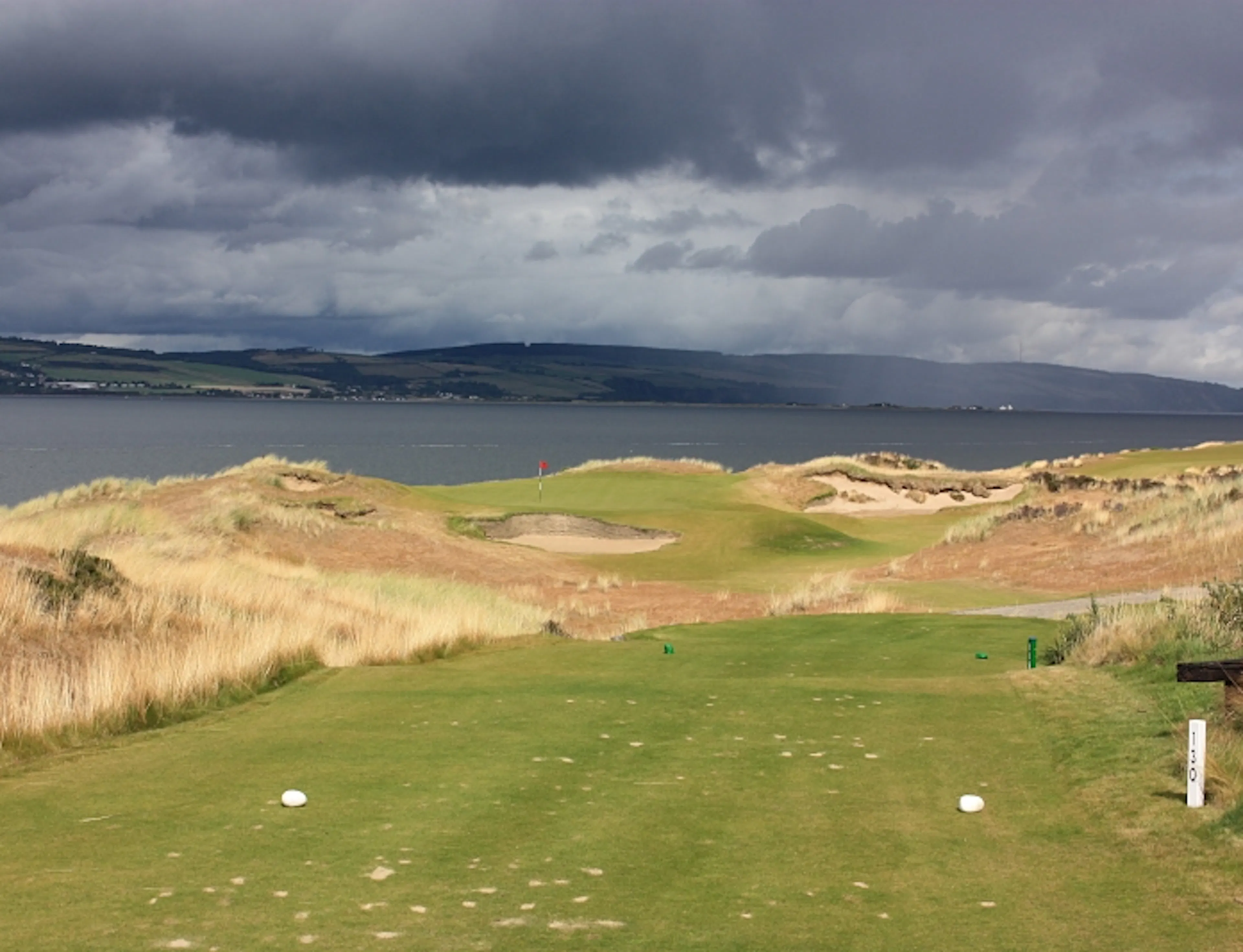Great view across the 12th hole at Castle Stuart Golf Links to the Moray Firth and the Black Isle. 