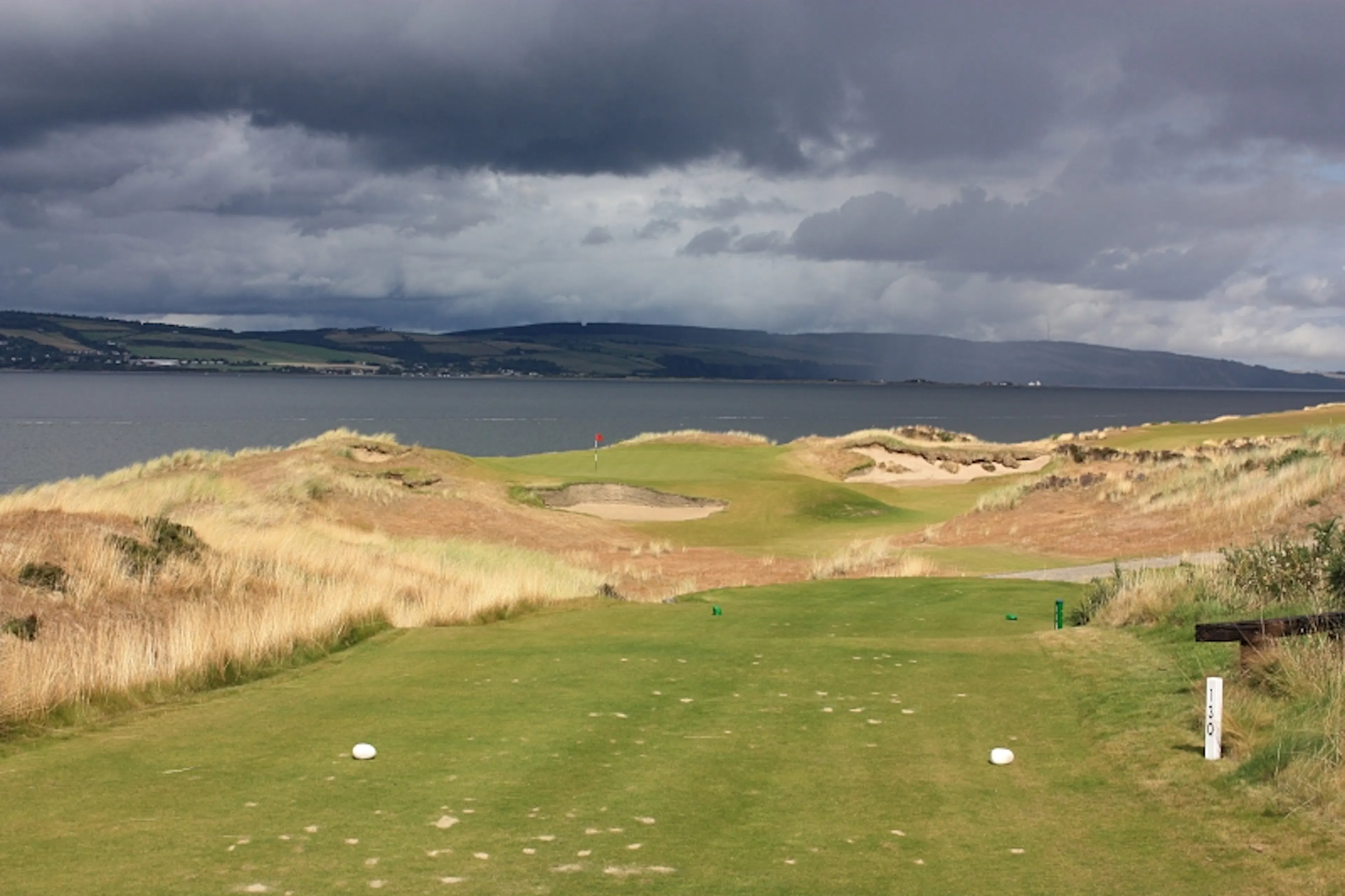 Great view across the 12th hole at Castle Stuart Golf Links to the Moray Firth and the Black Isle. 