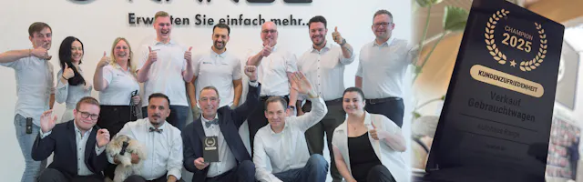 Teamfoto mit dem Preis Kundenzufriedenheit Gebrauchtwagen