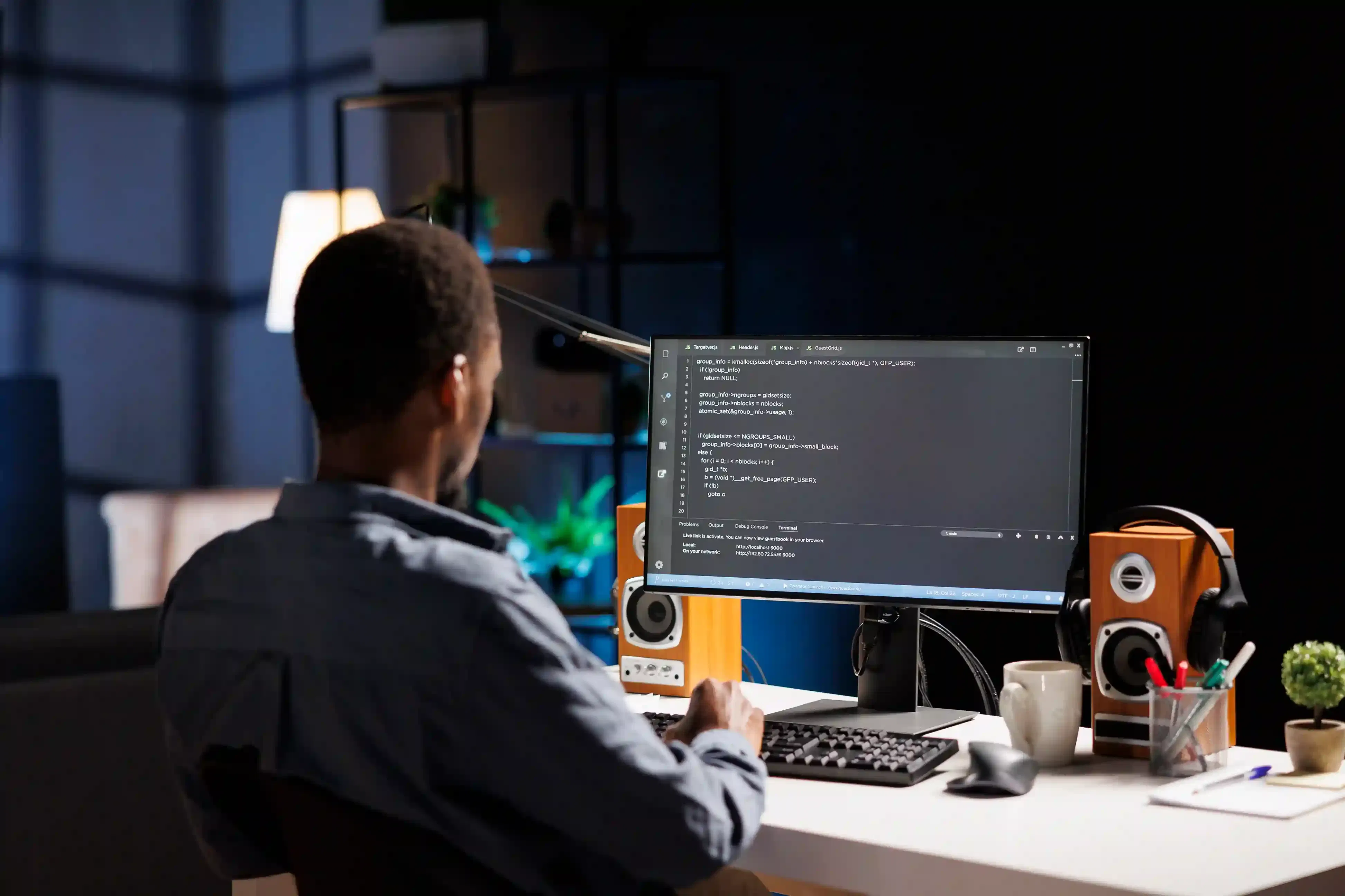 male developer entering binary data in terminal panel